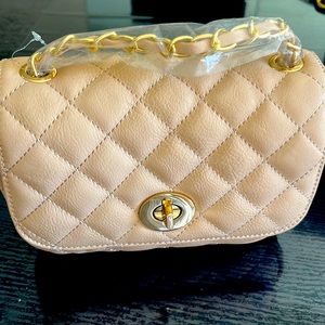 Brand New Quilted shoulder bag with gold hardware.  No further discount!